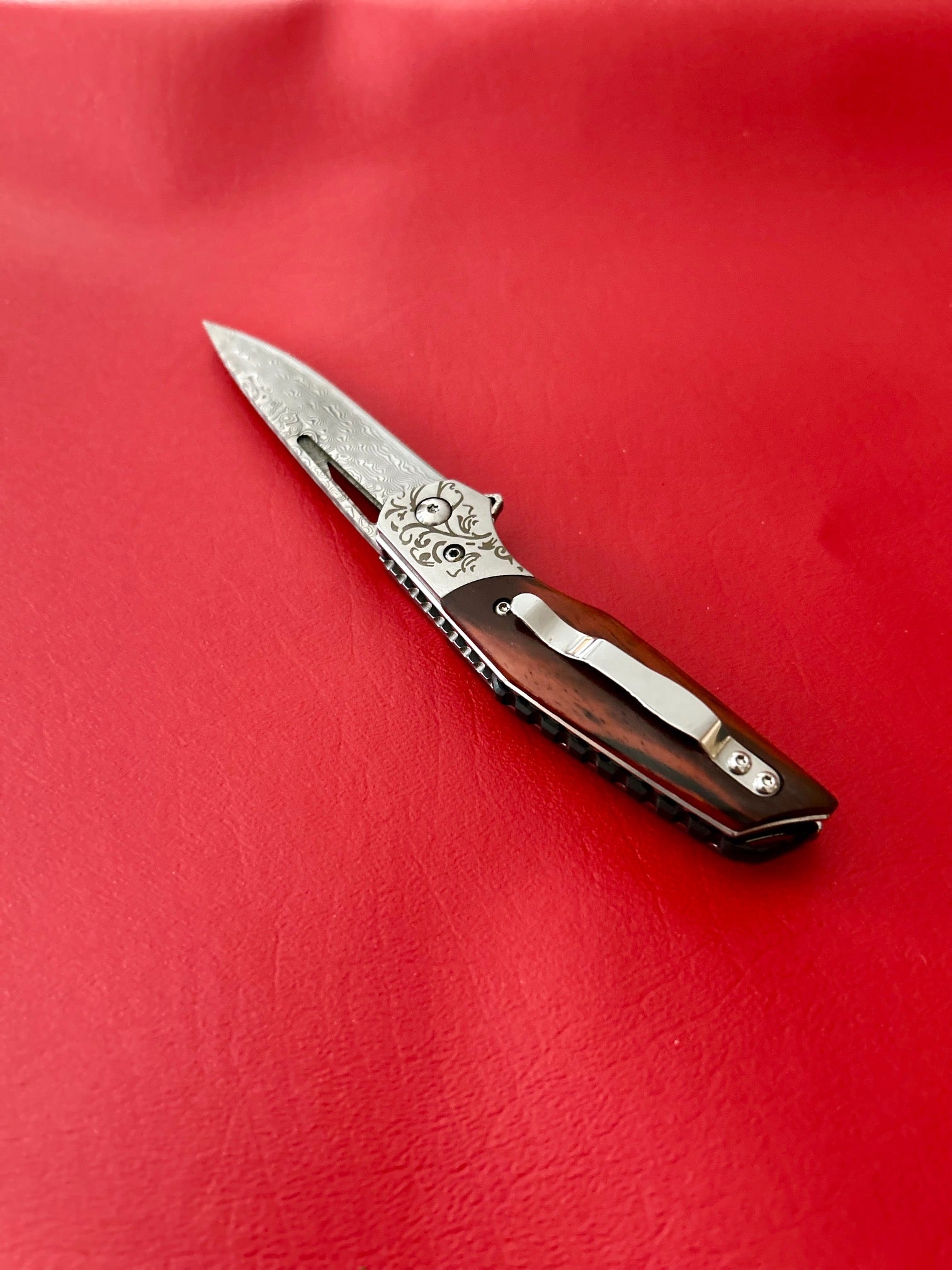 Damascus pocket folding knife with rosewood handle