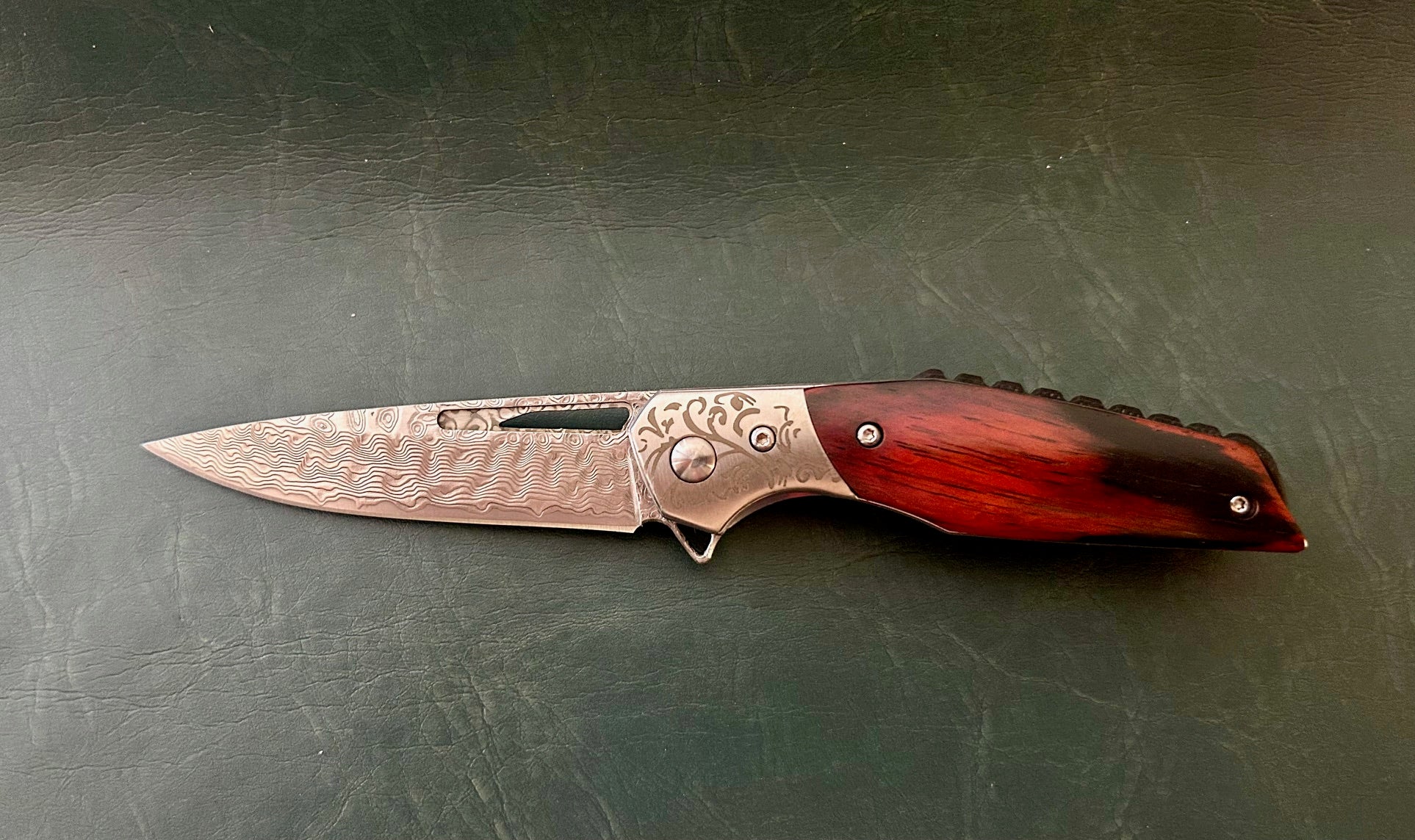 Damascus pocket folding knife with rosewood handle