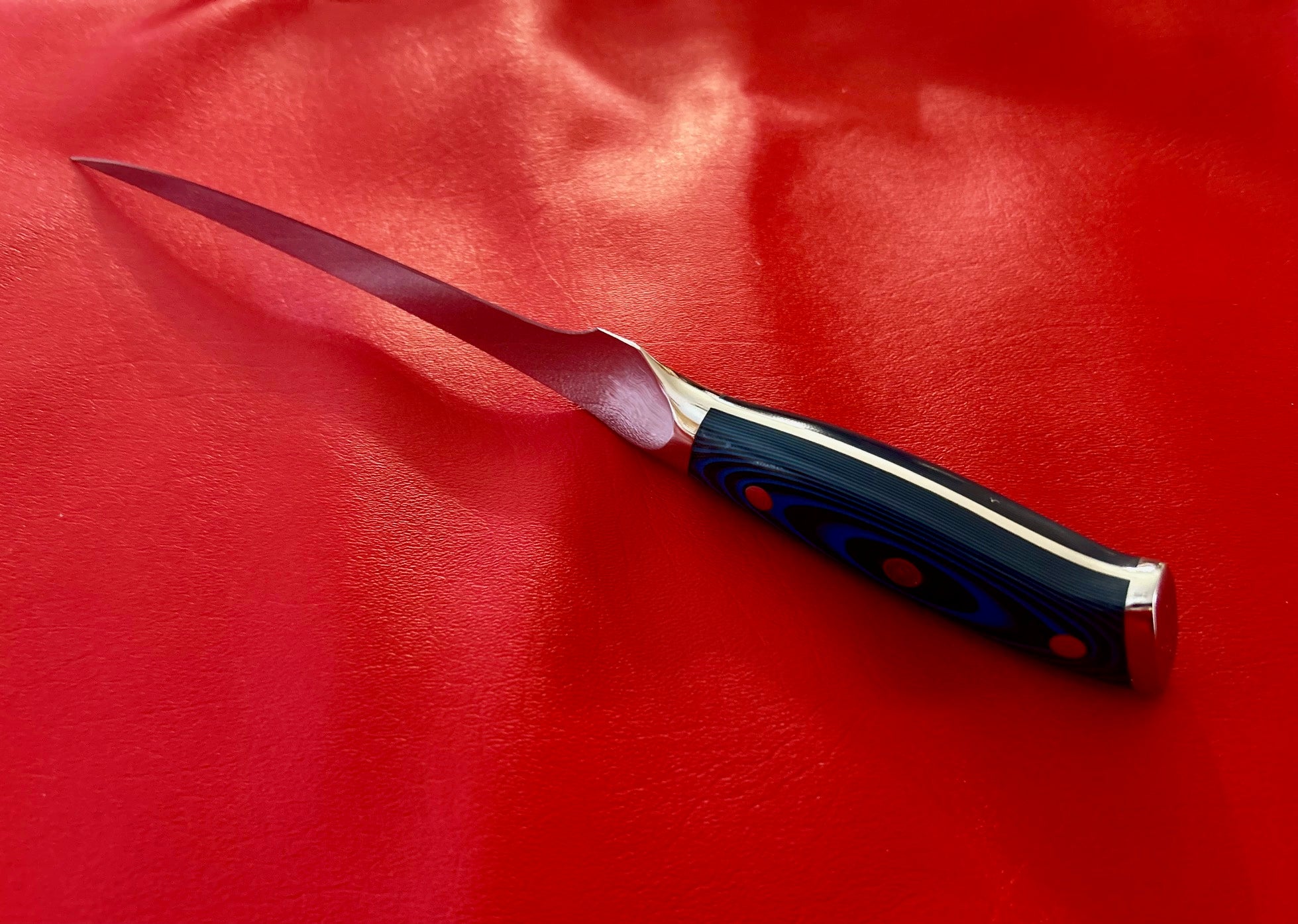 Filet carving knife  in 1.4116 German steel with Blue G10 handle